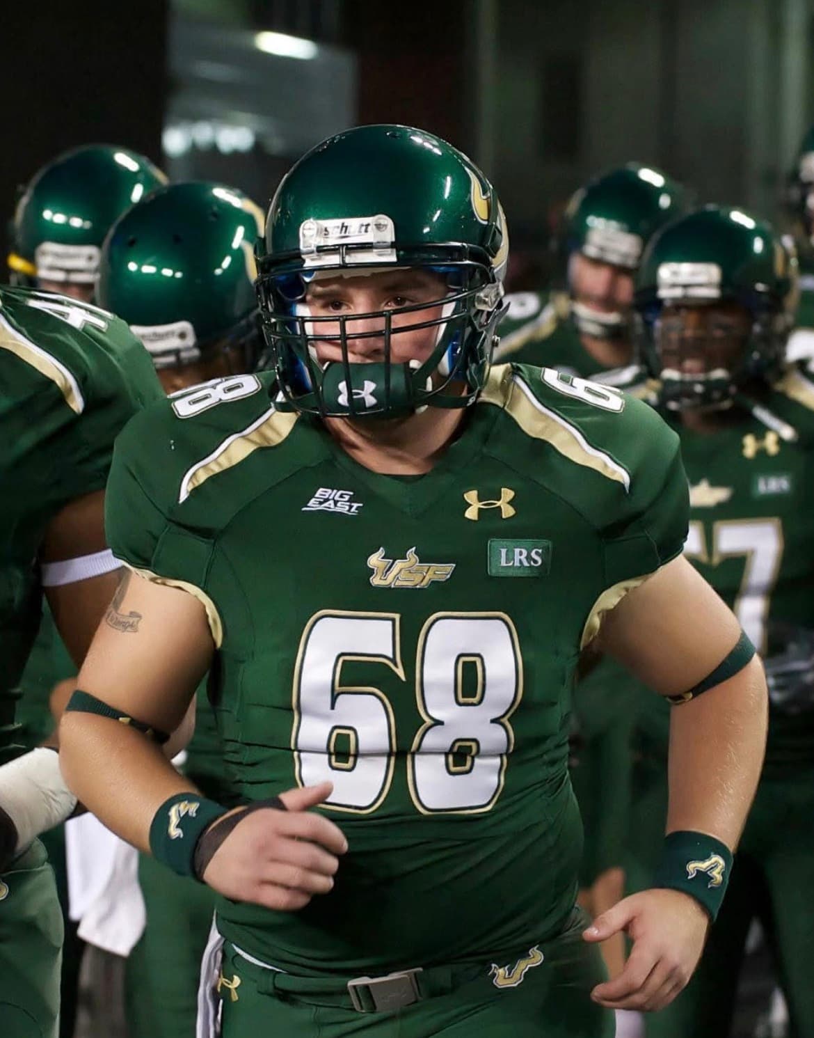 Mike Walsh leading his team out of the tunnel